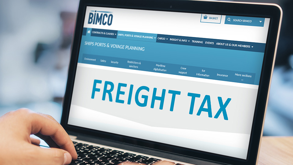 Image of a laptop monitor with the BIMCO website and the words "Freight tax"