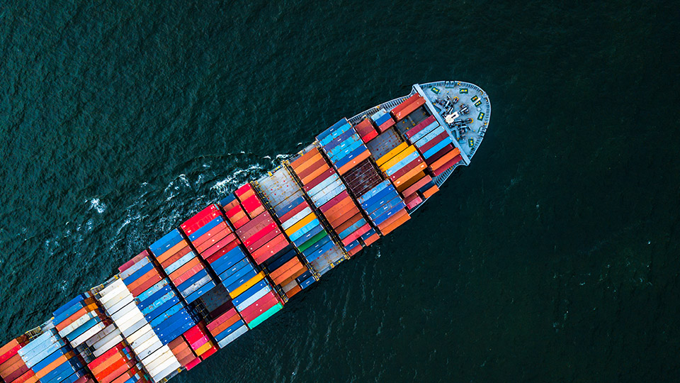 A bird view of a colourful container ship