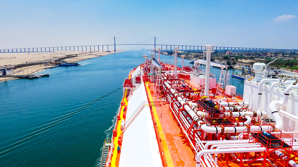LNG tanker navigating through the Suez Canal.