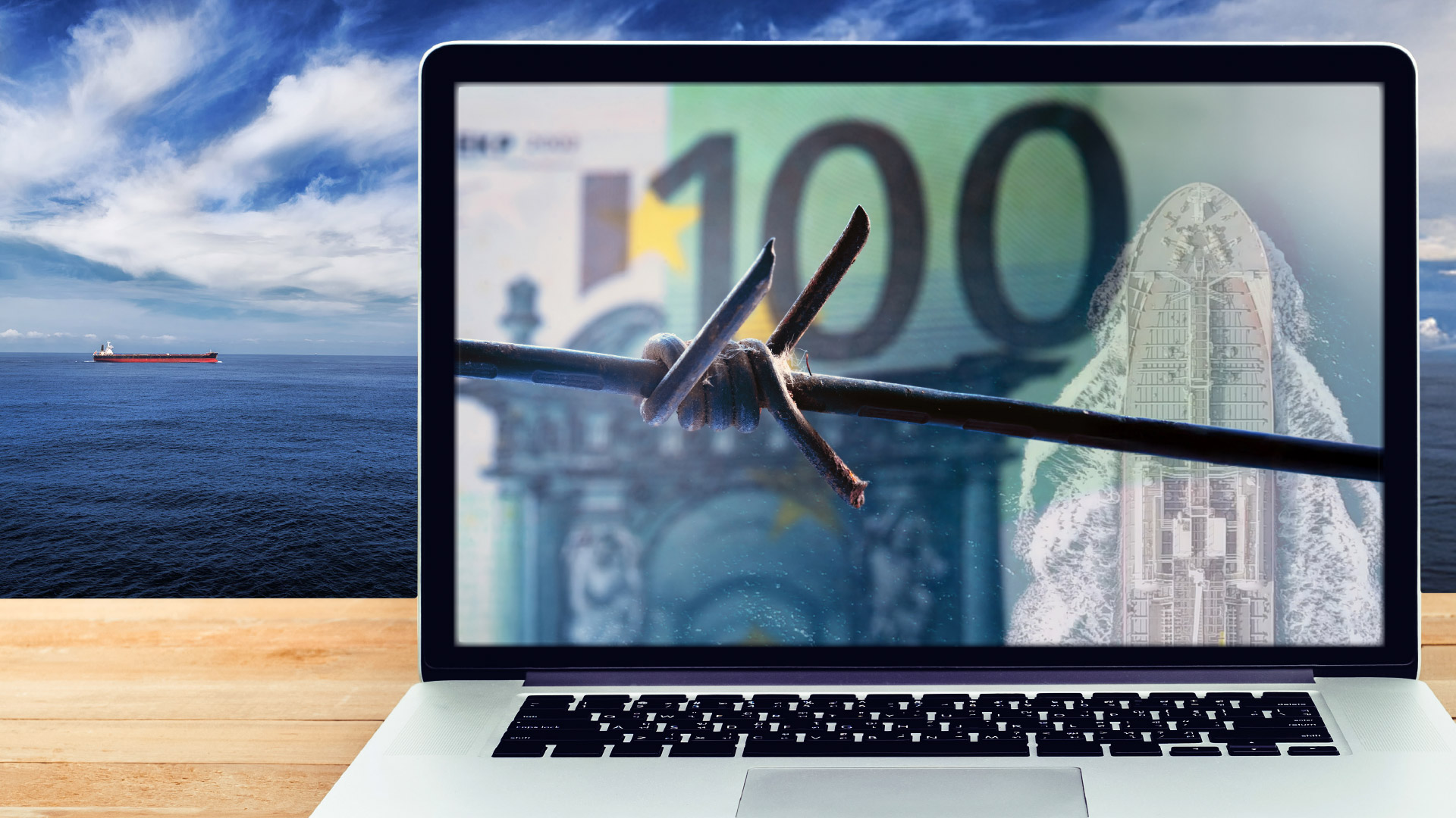 laptop on wooden table showing a close-up of barbed wire over a collage of a tanker ship and paper money
