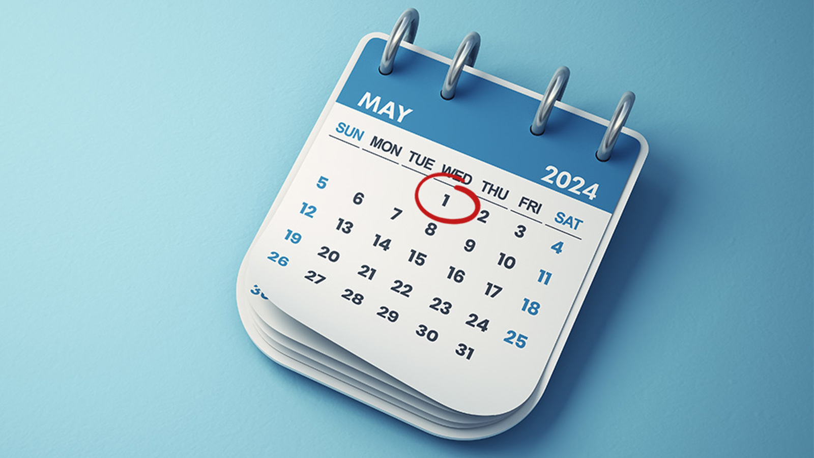 A rollover calendar showing 1 May ringed in red ink
