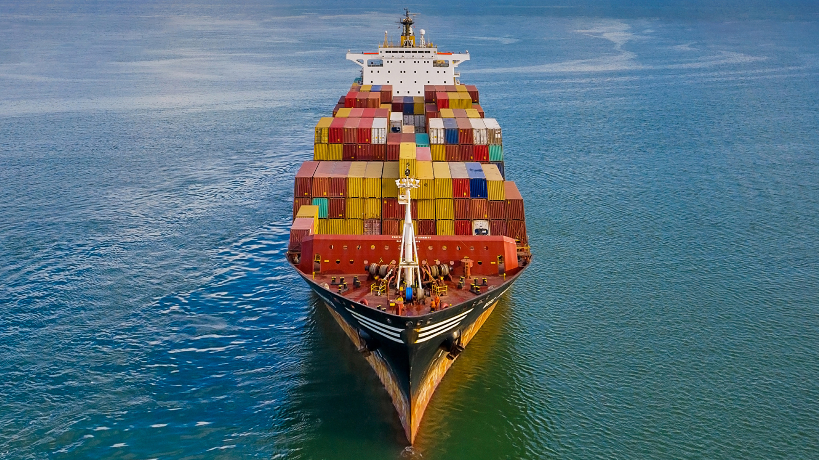 Container ship at sea seen from the bow