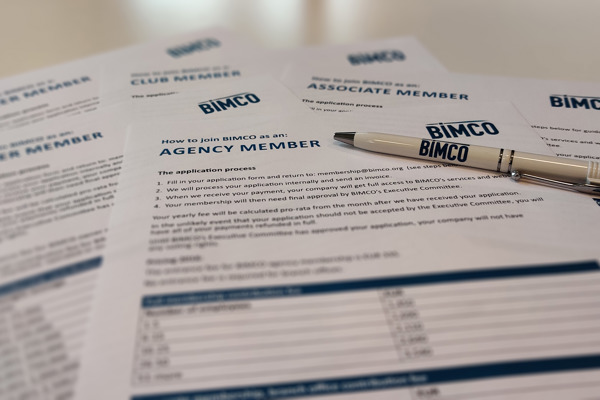 BIMCO applications forms with a pen on top of them